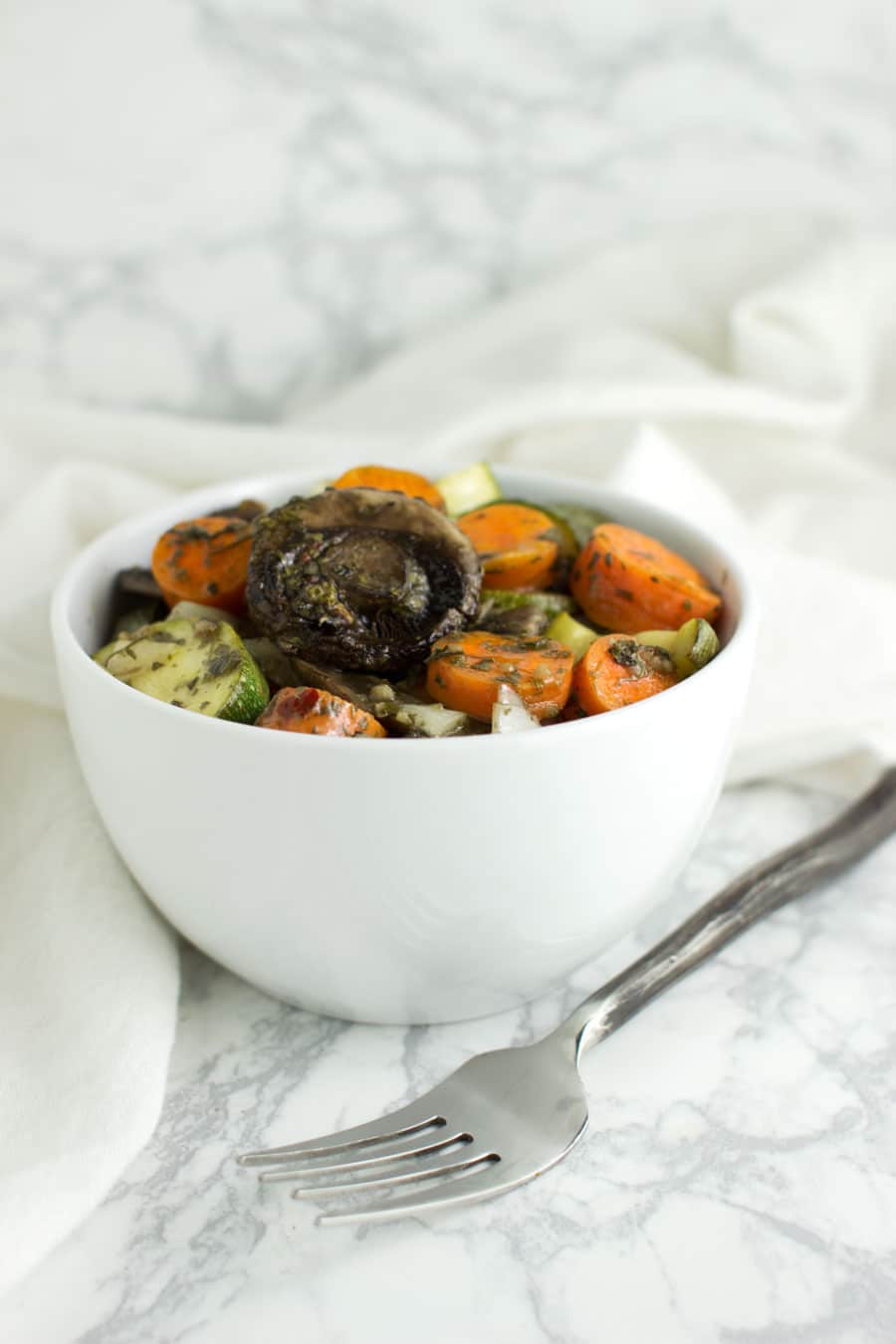 Roasted Mixed Vegetables with Charmoula Sauce recipe from acleanplate.com #aip #paleo #autoimmuneprotocol