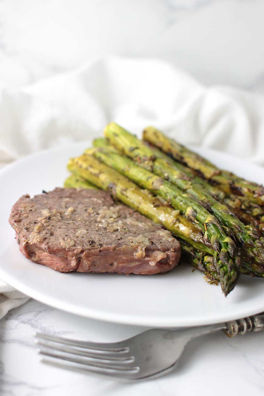 AIP Garlic Steak with Lemon-Pepper Asparagus recipe from acleanplate.com