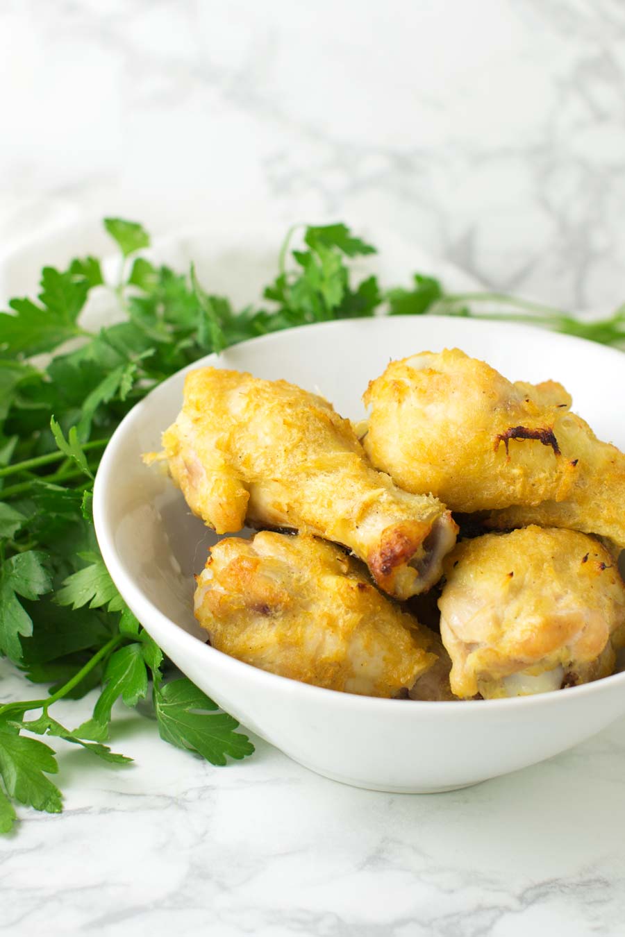 Pineapple Chicken Wings recipe from acleanplate.com #paleo #aip #glutenfree