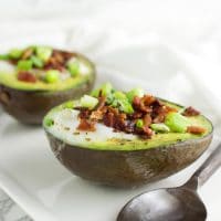 Baked Eggs in Avocados recipe from acleanplate.com #paleo #grainfree #glutenfree