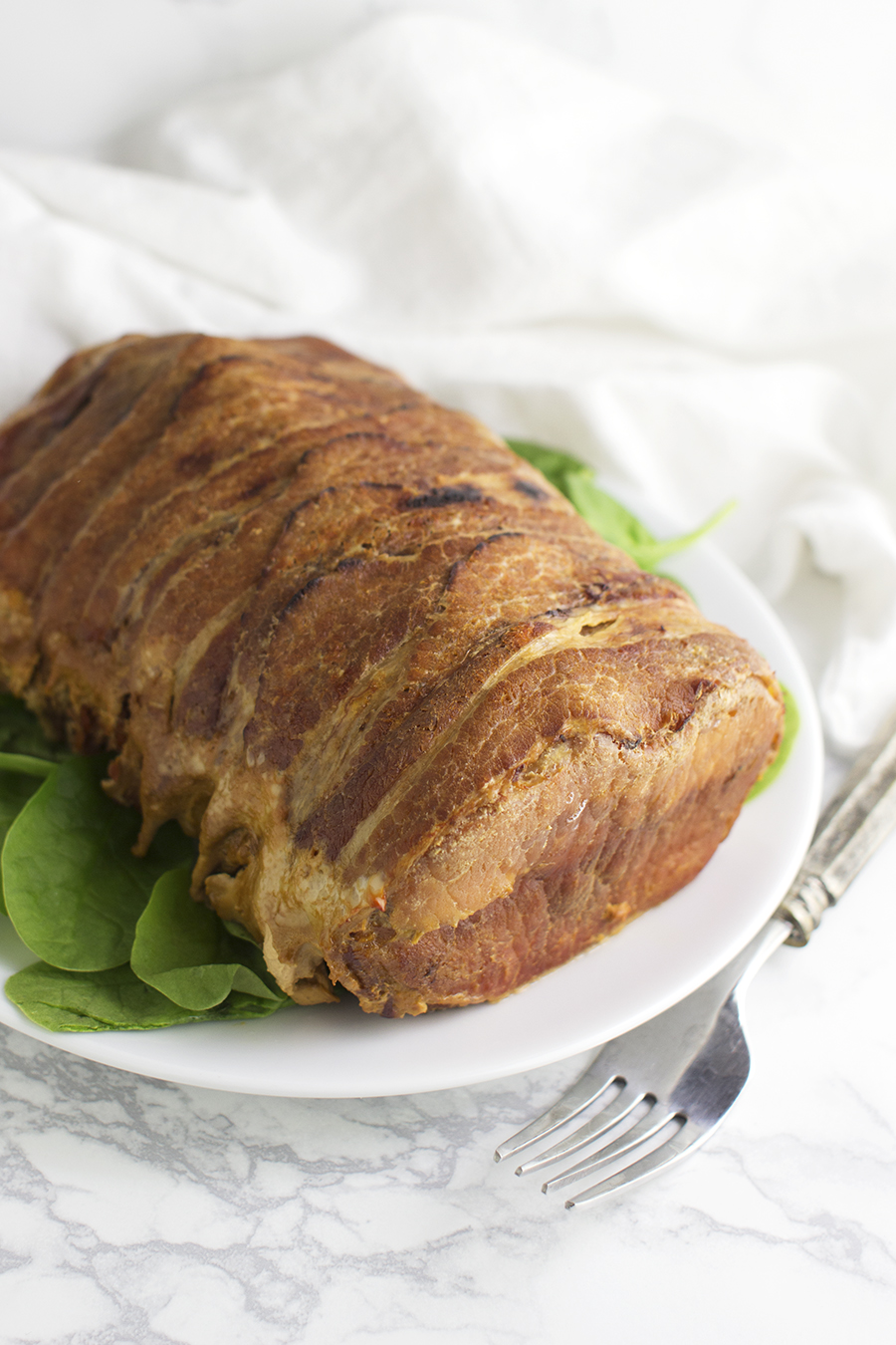 Bacon Wrapped Pork Roast recipe from acleanplate.com #paleo #aip #glutenfree
