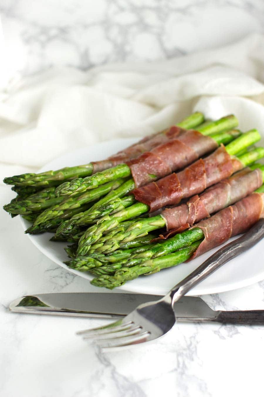 Prosciutto-Wrapped Asparagus recipe from acleanplate.com #paleo #aip #autoimmuneprotocol