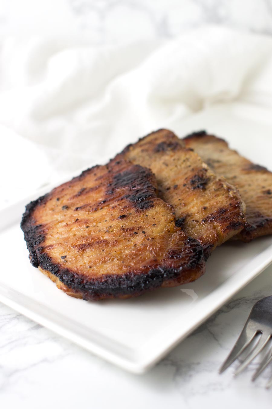 Sweet and Spicy Pork Chops recipe from acleanplate.com #paleo #glutenfree #primal