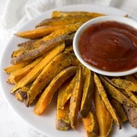 Garlic Herb Sweet Potato Fries recipe from acleanplate.com #aip #paleo #autoimmuneprotocol