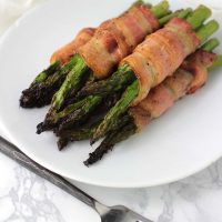 Bacon-Wrapped Asian Asparagus recipe from acleanplate.com #aip #autoimmuneprotocol #paleo