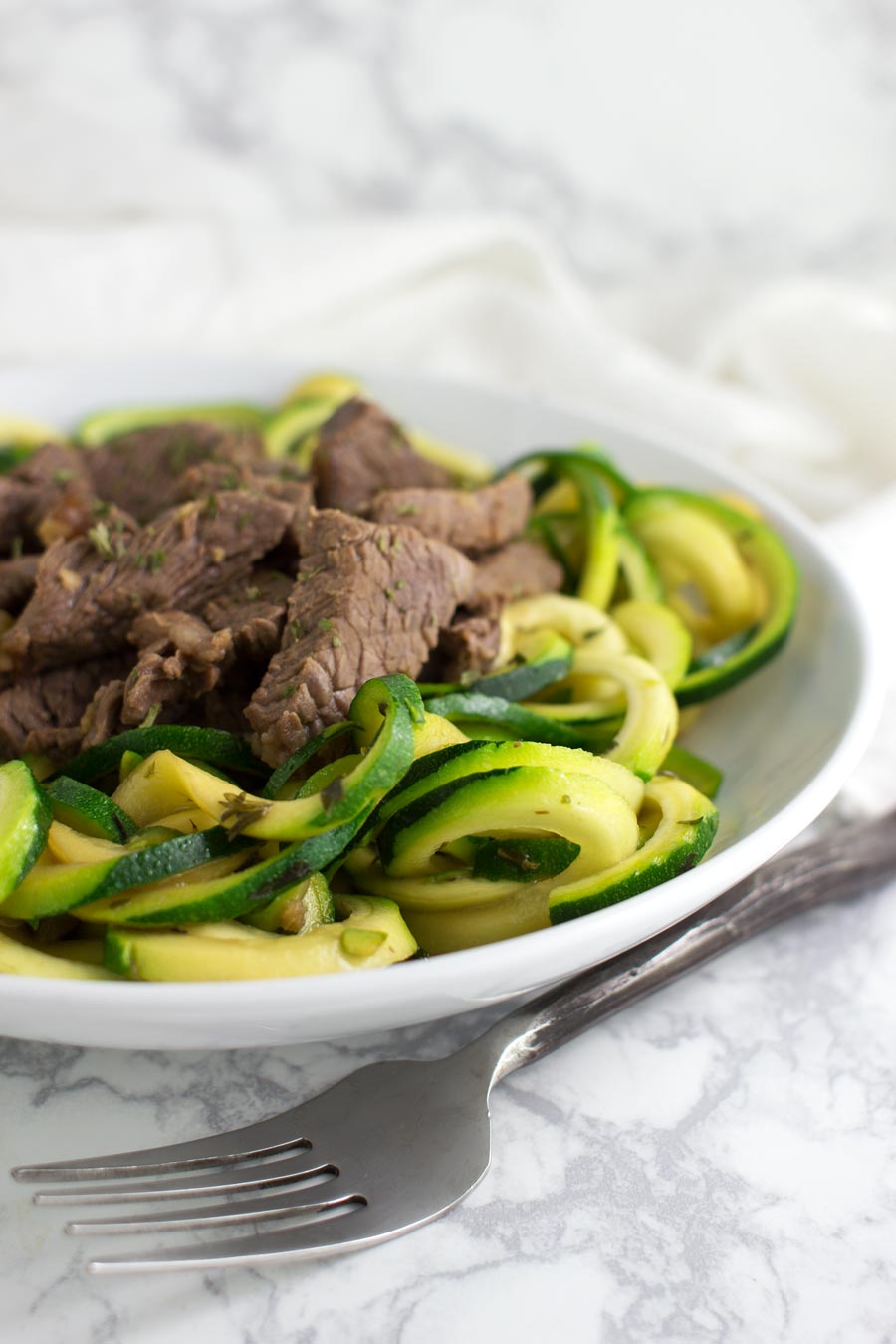 Garlic Steak Zoodles recipe from acleanplate.com #paleo #aip #autoimmuneprotocol