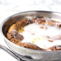 Cinnamon Roll Dutch Baby recipe from acleanplate.com #paleo #glutenfree #dairyfree