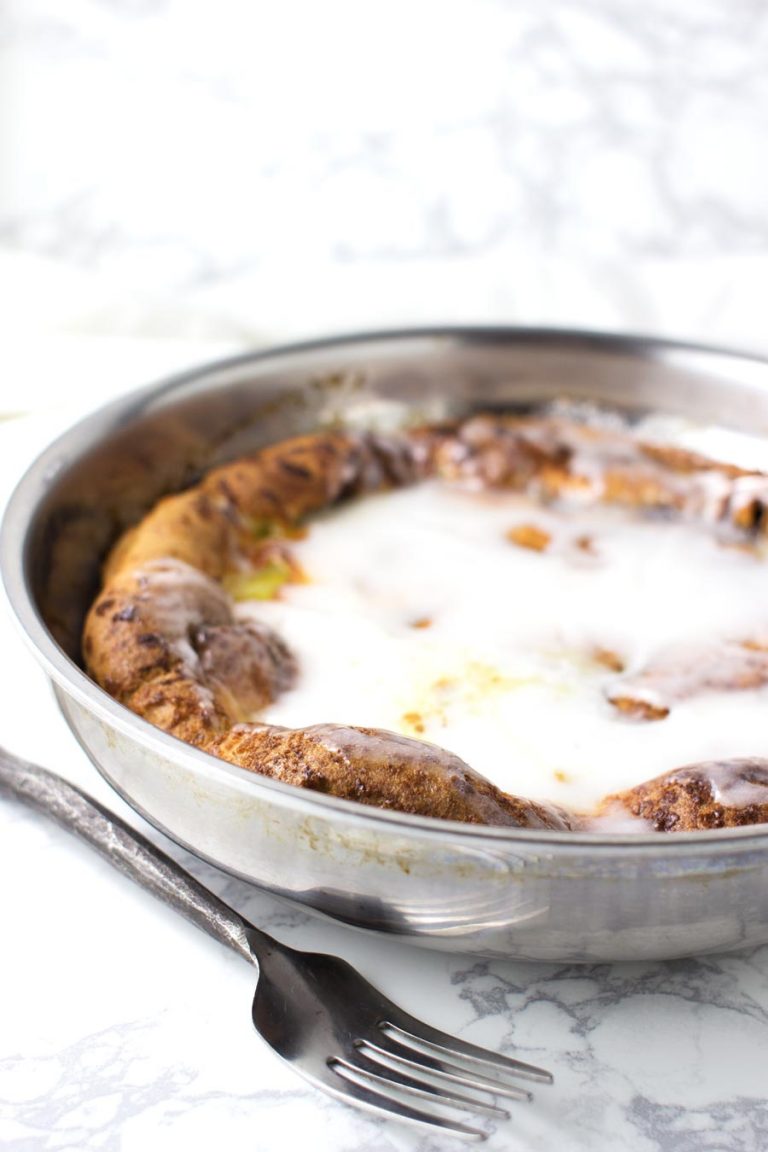 Cinnamon Roll Dutch Baby recipe from acleanplate.com #paleo #glutenfree #dairyfree