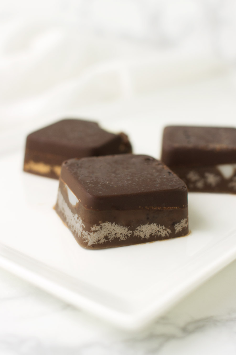 Copycat Cadbury Creme Squares recipe from acleanplate.com #paleo #aip #glutenfree